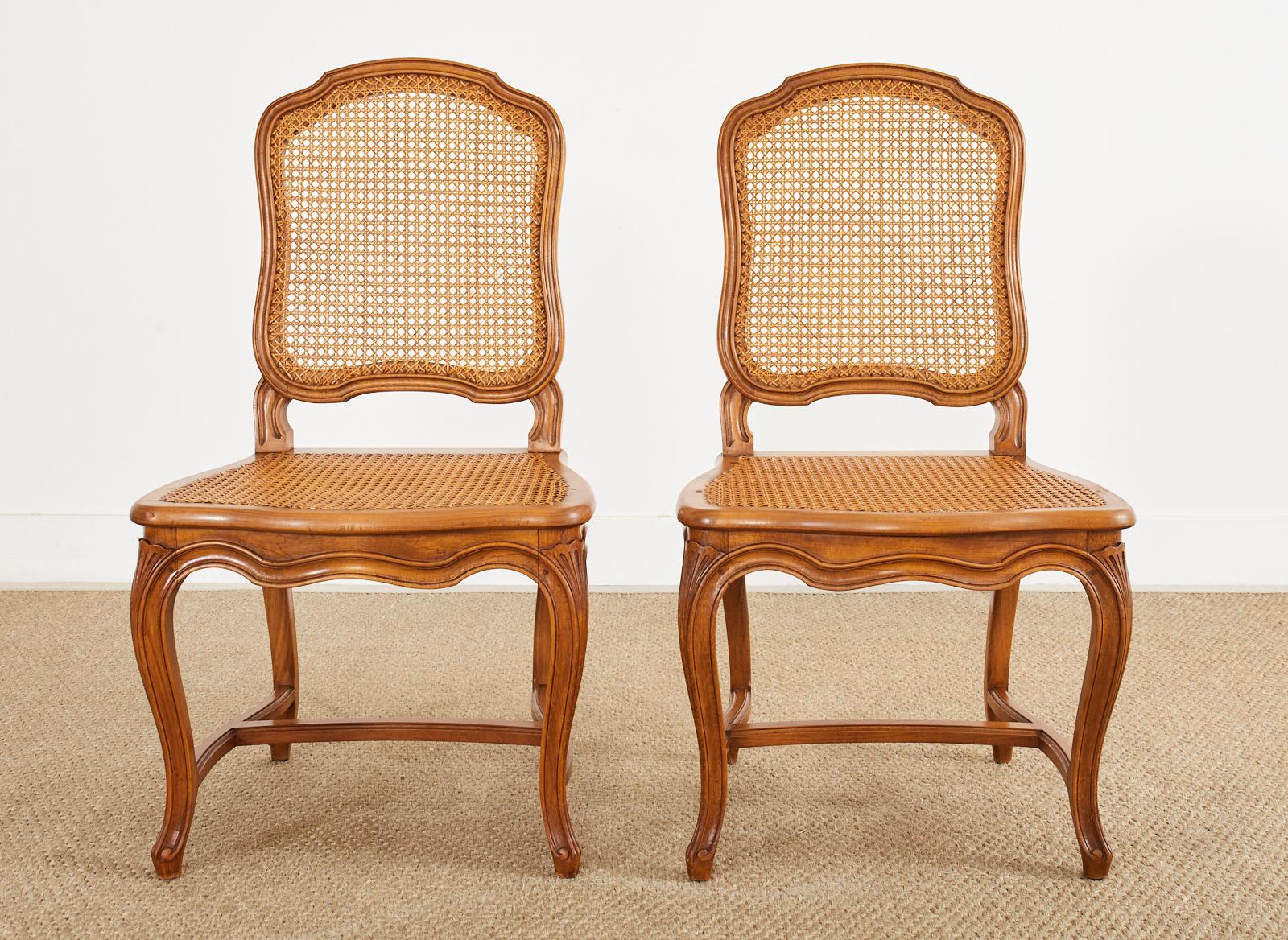 Hand-Crafted Set of Twelve Country French Provincial Fruitwood Caned Dining Chairs 
