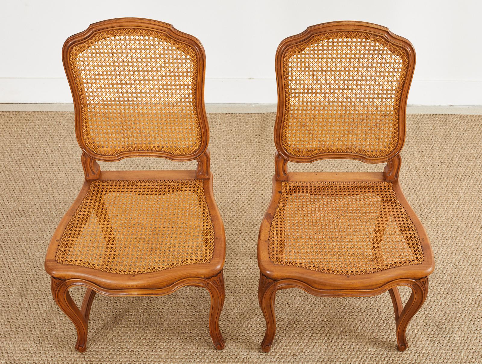 Set of Twelve Country French Provincial Fruitwood Caned Dining Chairs  In Good Condition In Rio Vista, CA