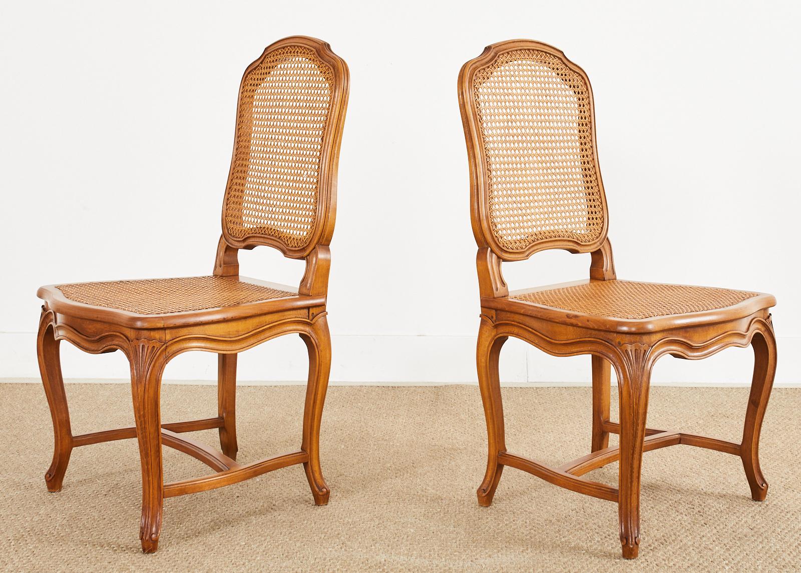 Set of Twelve Country French Provincial Fruitwood Caned Dining Chairs  1