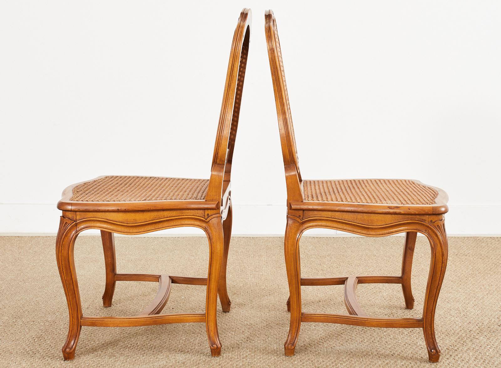 Set of Twelve Country French Provincial Fruitwood Caned Dining Chairs 2