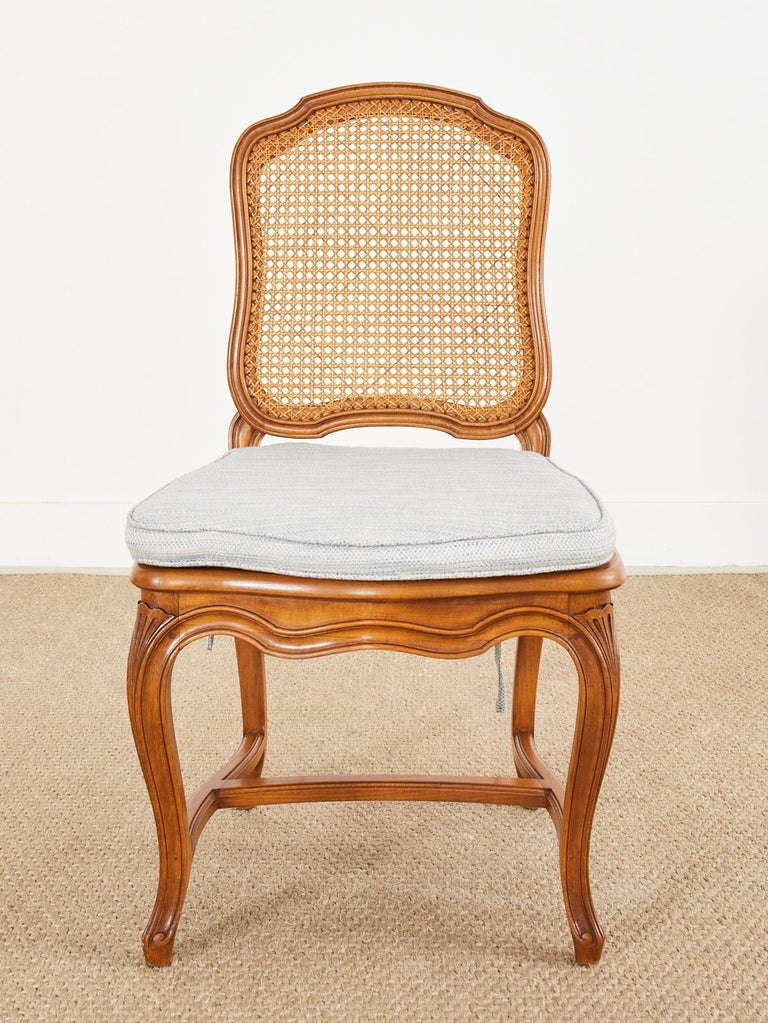 Set of Twelve Country French Provincial Fruitwood Caned Dining Chairs