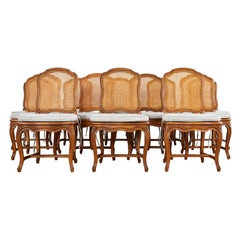 Set of Twelve Country French Provincial Fruitwood Caned Dining Chairs