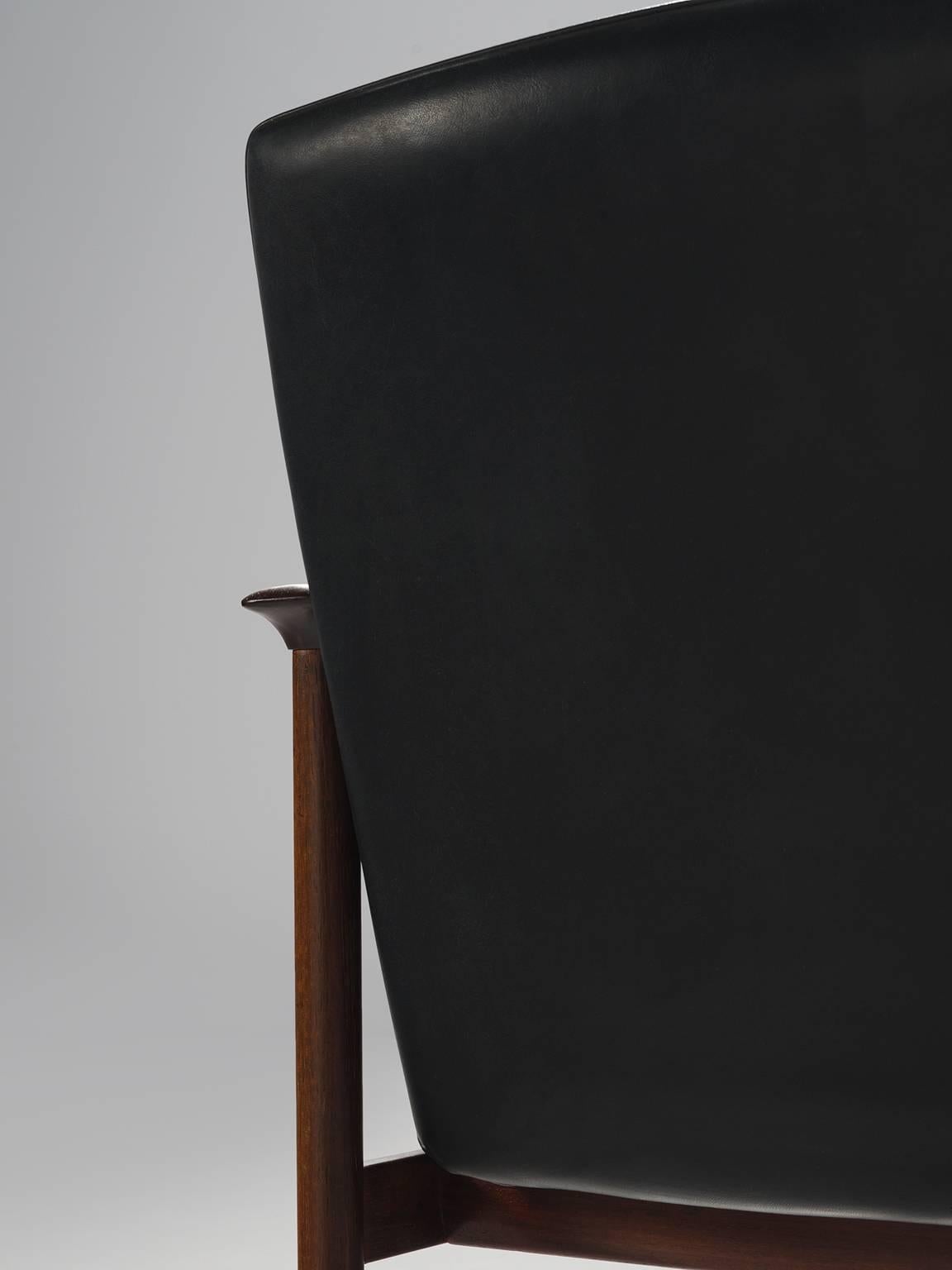 Faux Leather Set of Twelve Danish Armchairs