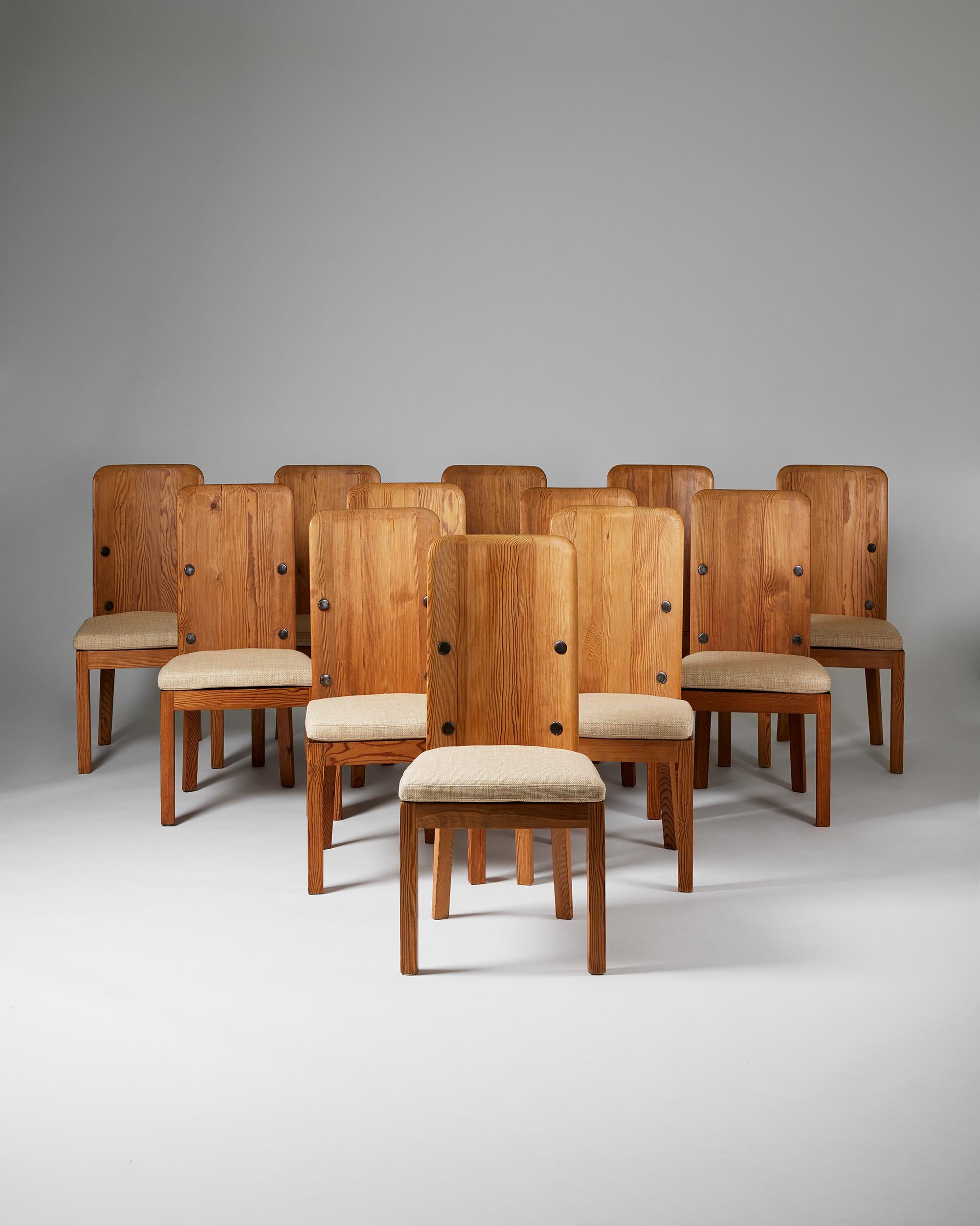 Set of twelve dining chairs model ‘Lovö’ designed by Axel-Einar Hjorth for Nordiska Kompaniet,
Sweden, 1930s

Pine and texile.

H: 96.5 cm
W: 47.5 cm
D: 42 cm
SH: 40.5 cm
SH with cushion: 45.5 cm

From 1927 to 1938, Axel-Einar Hjorth was