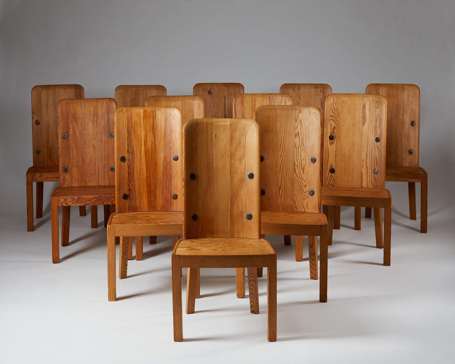 Set of twelve dining chairs model “Lovö”, designed by Axel-Einar Hjorth for NK, 
Sweden, 1930s

Pine.