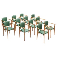 Set of Twelve Sculptural Dining Chairs With Elegant Wooden Frames