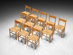 Lot de douze chaises de salle à manger élégantes, de style rustique et « mid-century modern », en chêne et jonc