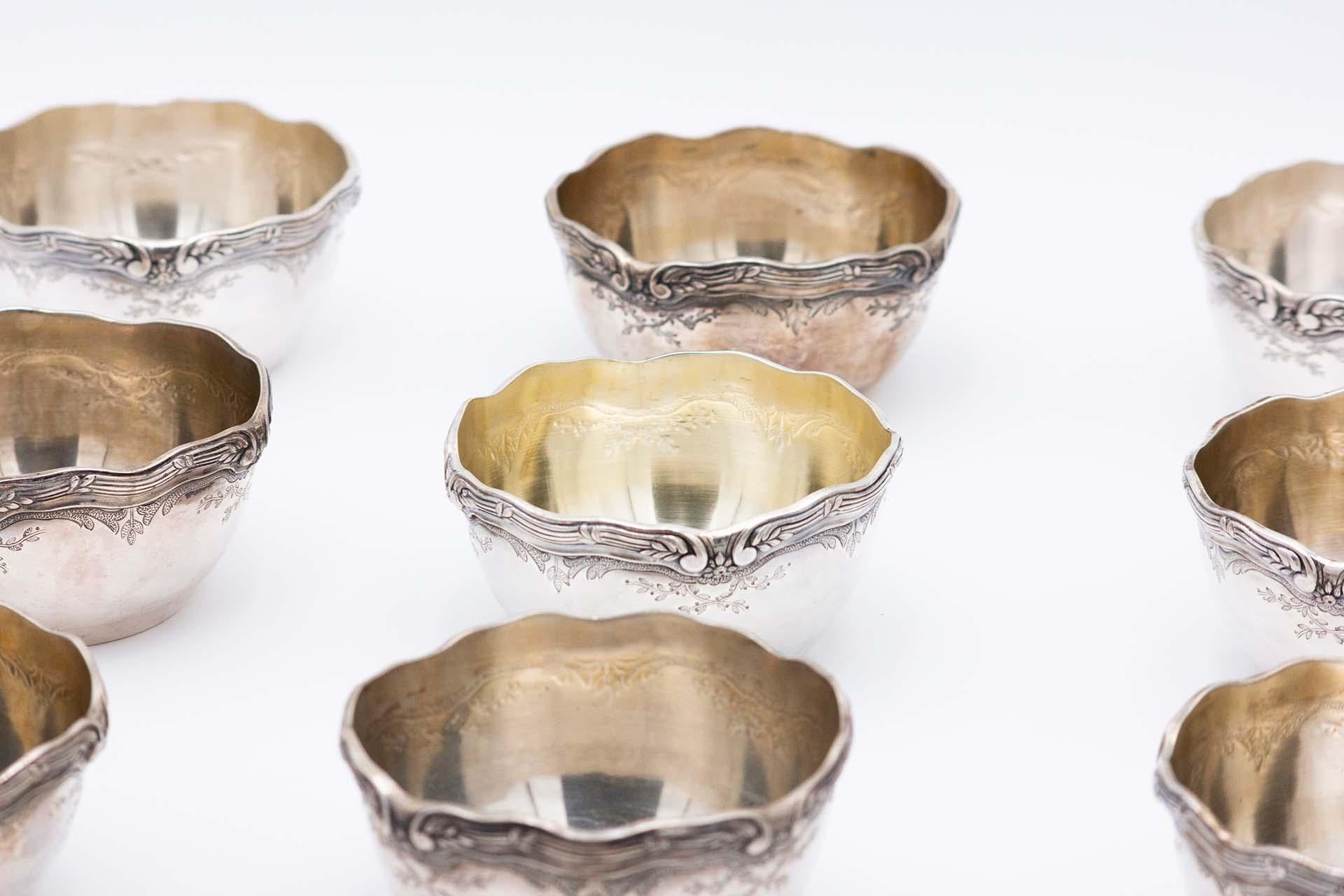 European Set of twelve embossed silver washbasins For Sale