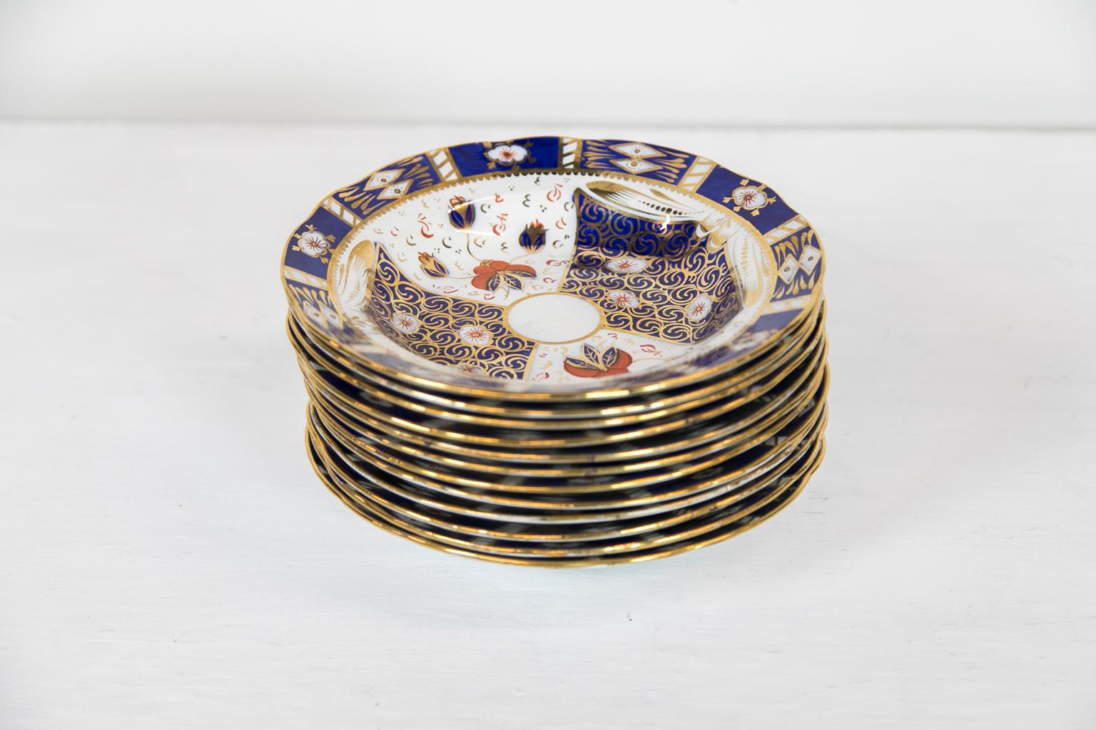 Pottery Set of Twelve English Staffordshire Soup Plates For Sale