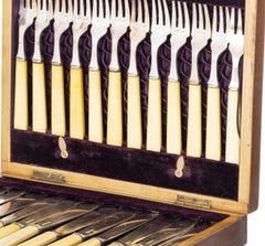 Set of twelve fish forks and knives - 19th century