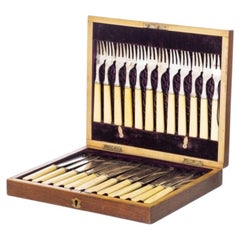 Set of twelve fish forks and knives - 19th century