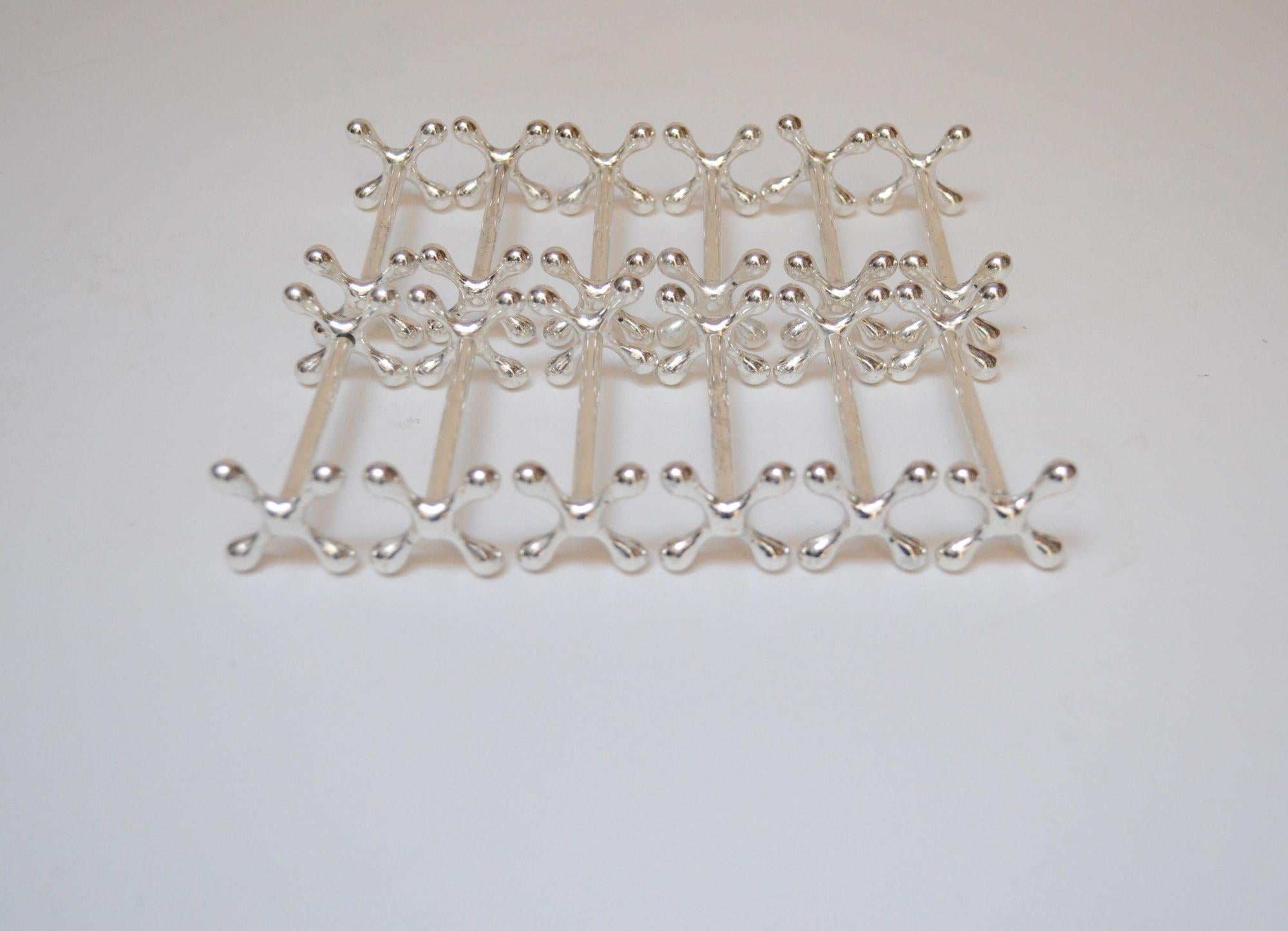 Silver Plate Set of Twelve Italian Art Deco Jax / X Form Mitred Silver-Plated Knife Rests For Sale