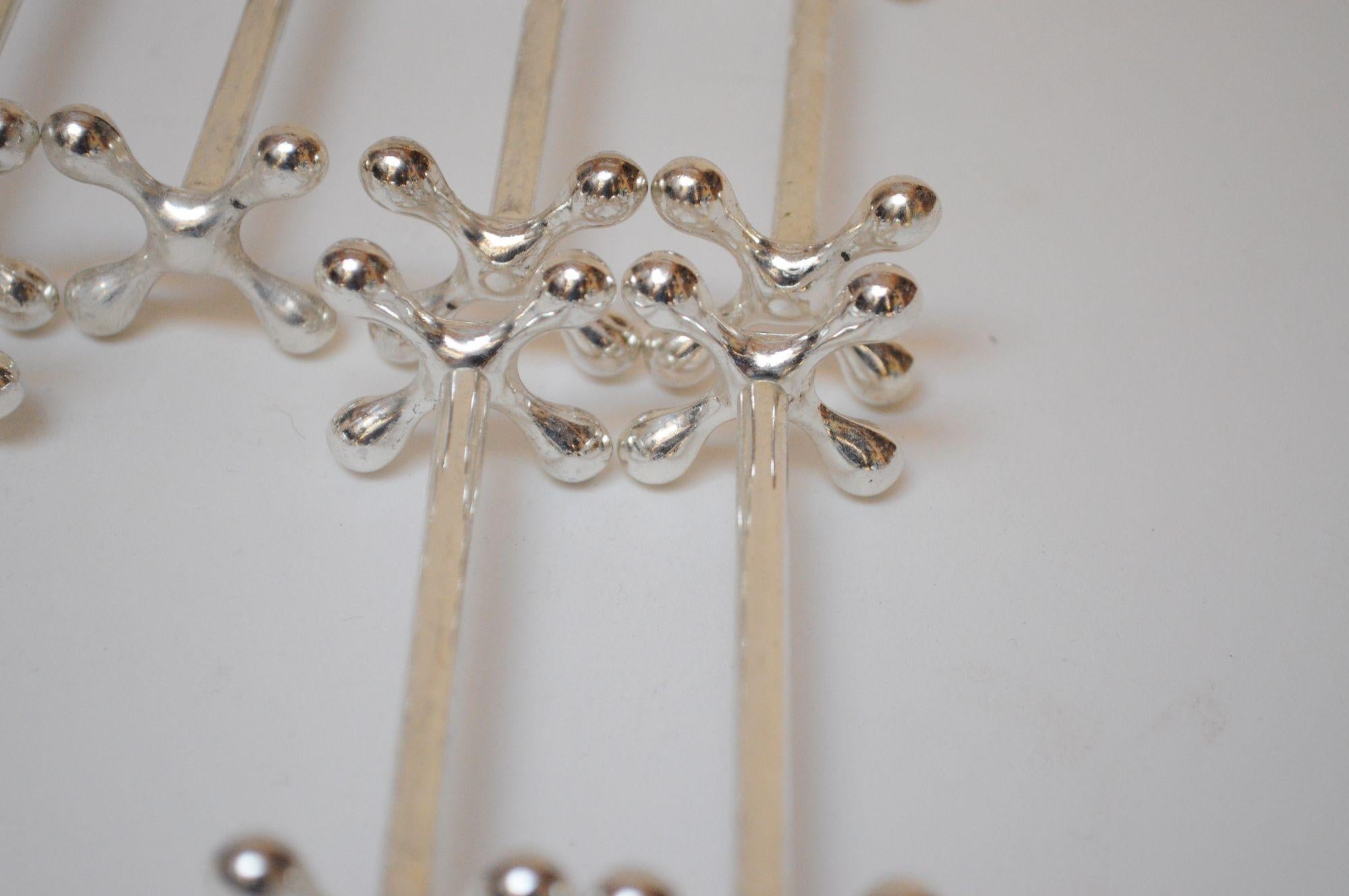 Set of Twelve Italian Art Deco Jax / X Form Mitred Silver-Plated Knife Rests For Sale 9