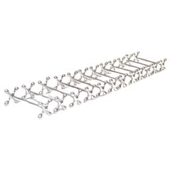 Set of Twelve Italian Art Deco Jax / X Form Mitred Silver-Plated Knife Rests
