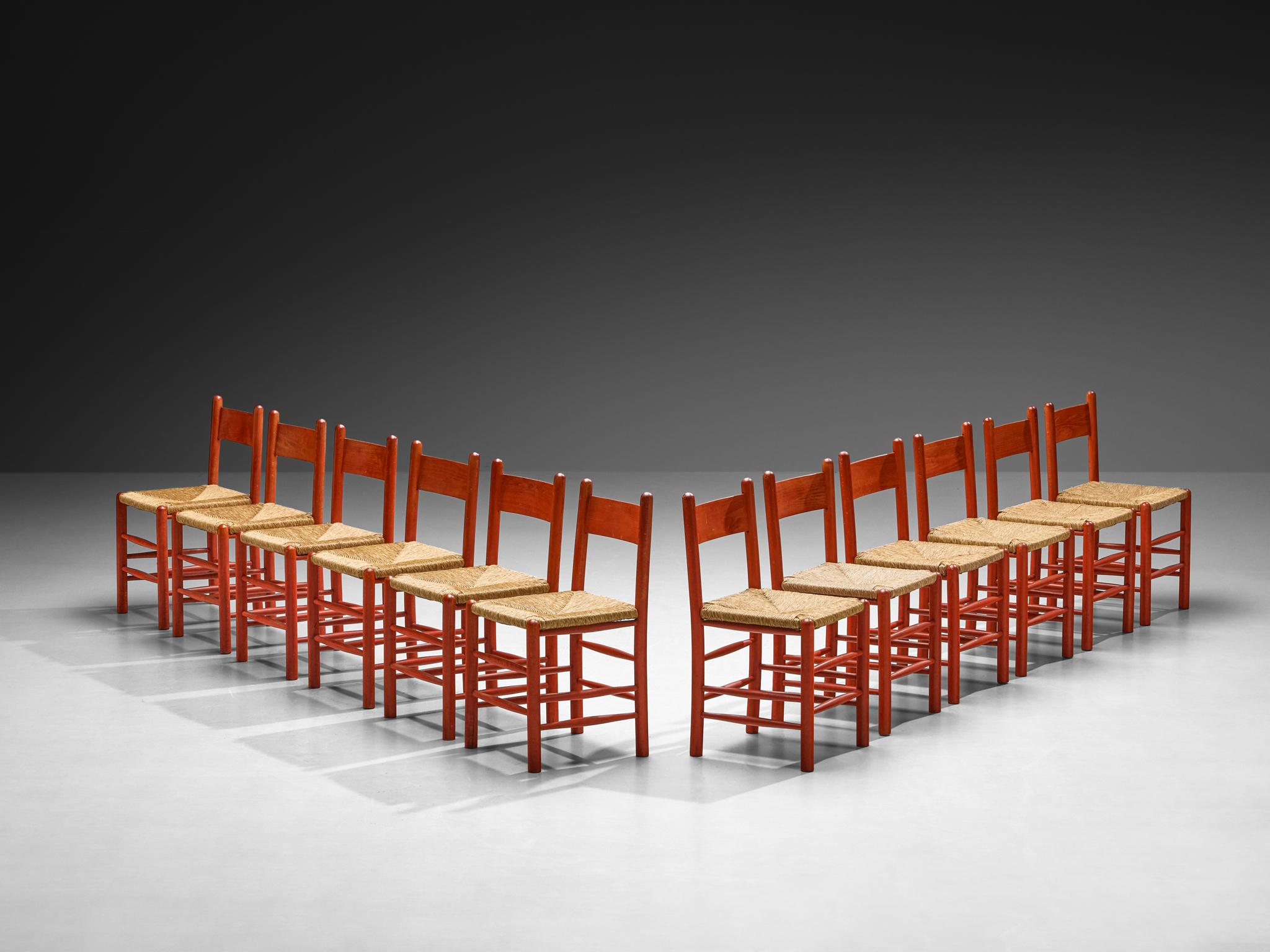 Set di dodici sedie da pranzo, faggio, paglia, Francia, anni '60.

Splendido set di dodici sedie francesi con struttura in faggio rosso e classiche sedute in paglia organica. Questo set di dodici sedie da pranzo è caratterizzato da una solida