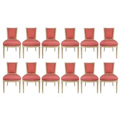 Ensemble de douze chaises de salle à manger patinées de style Louis XVI du début du XIXe siècle français