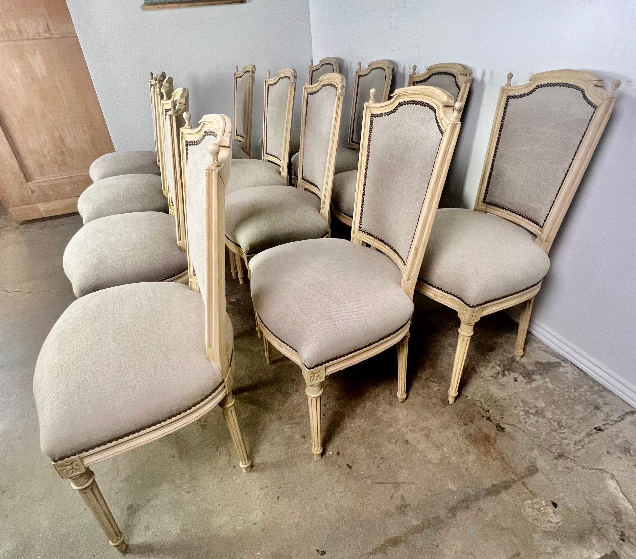 Set of Twelve French Louis XVI Style Dining Chairs, circa 1930s In Distressed Condition In Los Angeles, CA