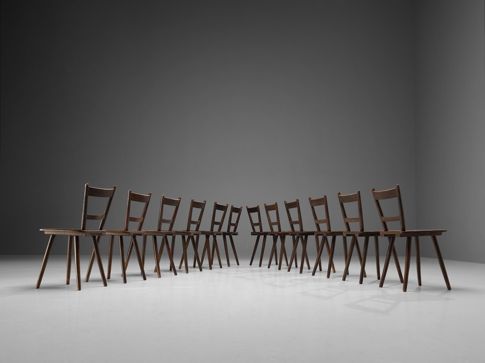 Mid-20th Century Set of Twelve French Pastoral Dining Chairs in Stained Wood