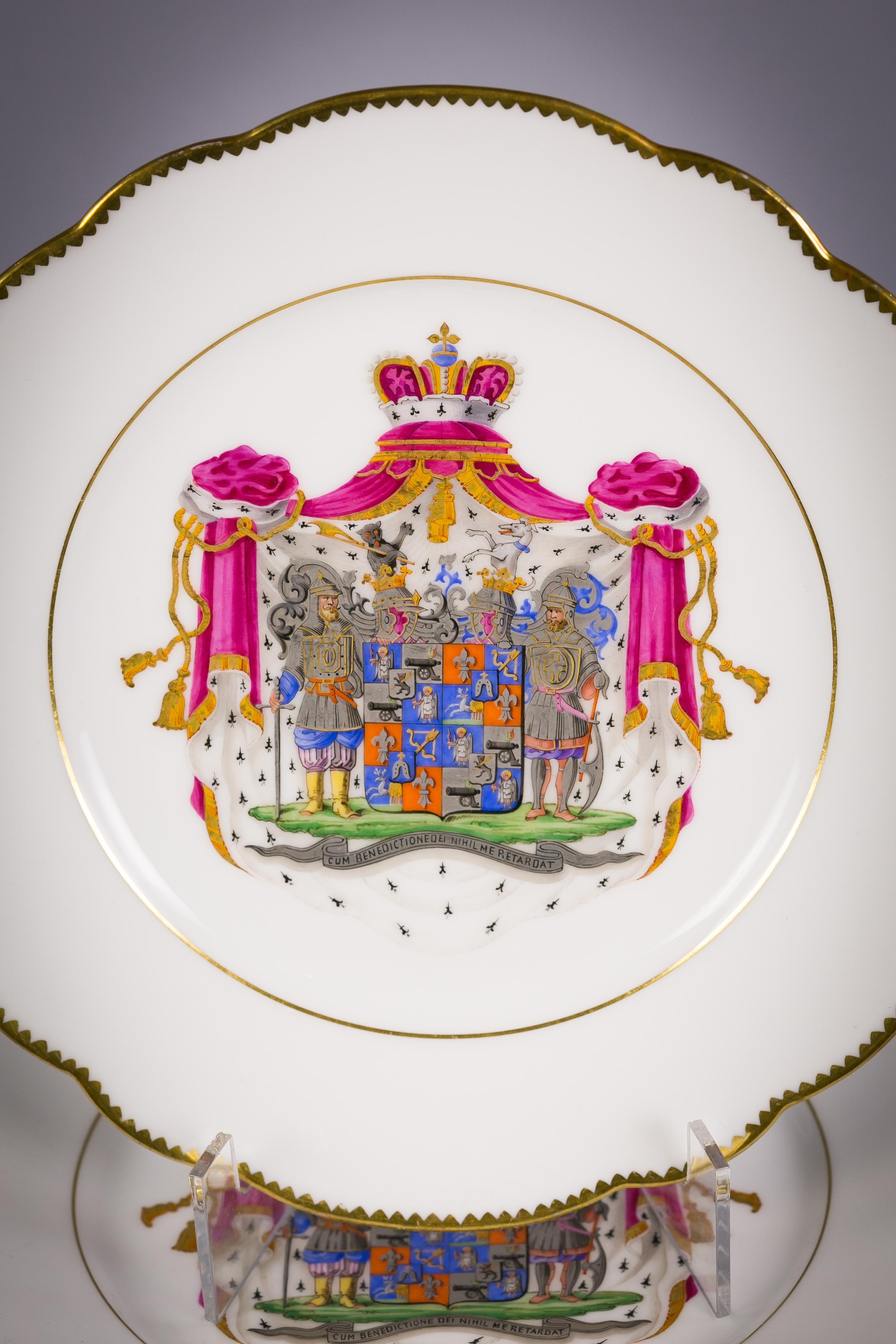 Set of twelve French porcelain armorial lunch plates, circa 1880.