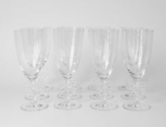 Set of twelve fun and elegant Marc Aurel water glasses with jigsaw stem