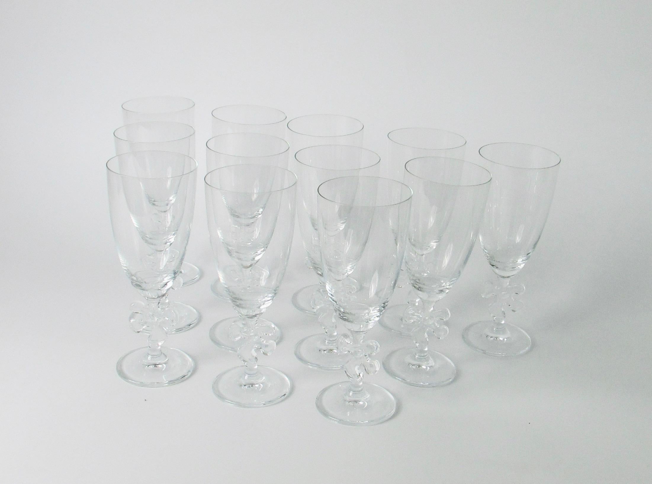 American Set of twelve fun and elegant Marc Aurel water glasses with jigsaw stem For Sale