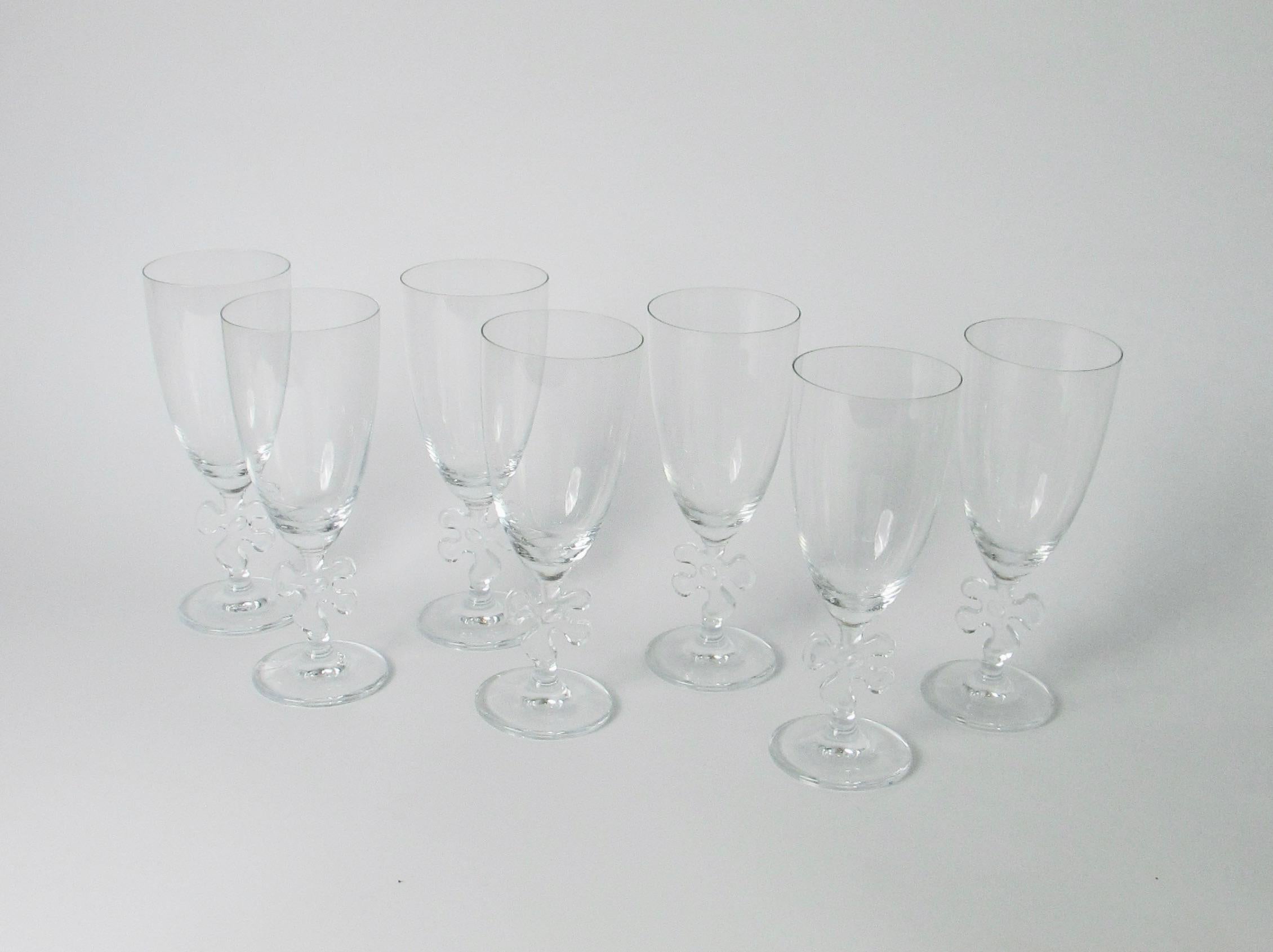 Cast Set of twelve fun and elegant Marc Aurel water glasses with jigsaw stem For Sale