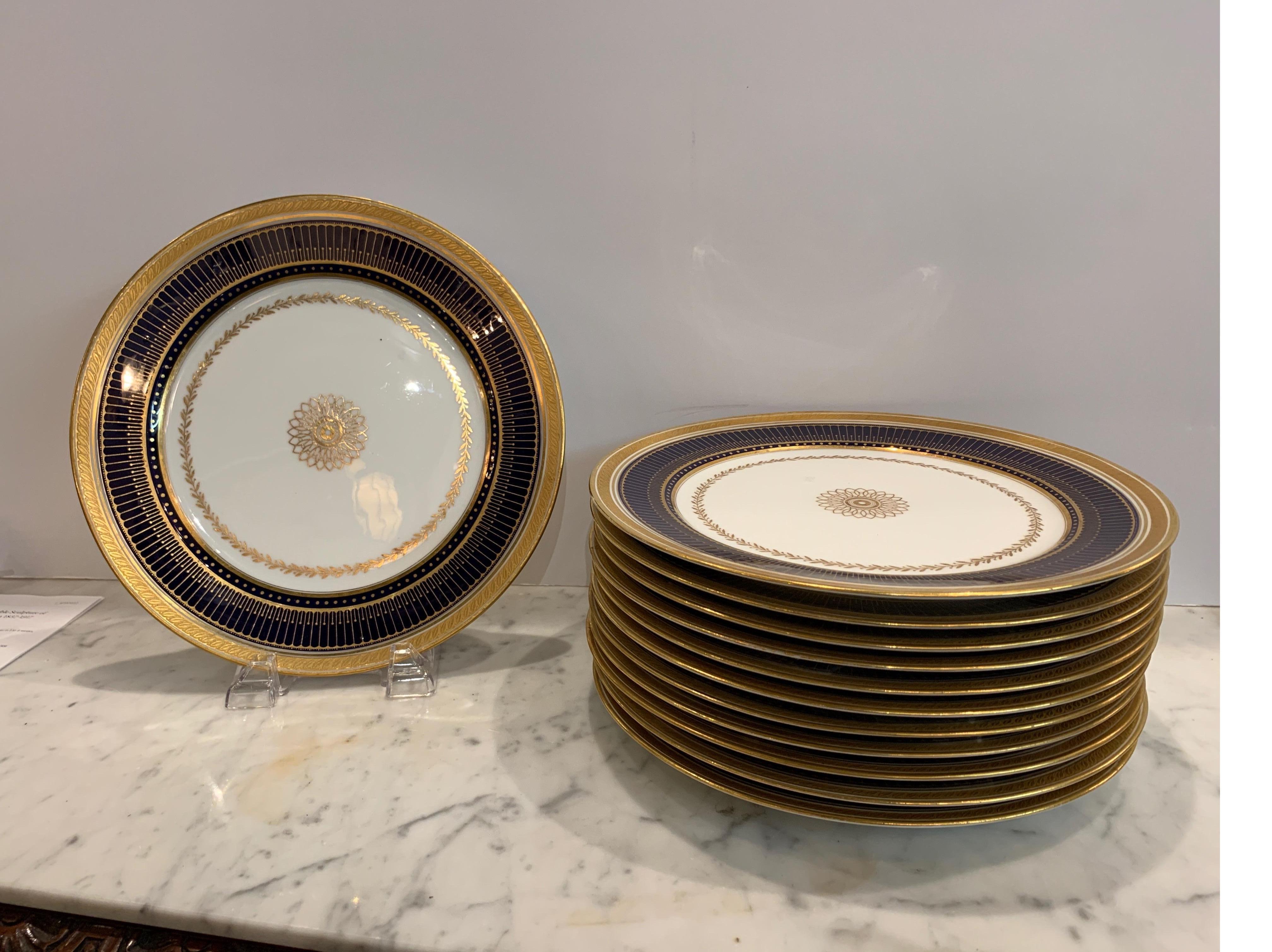 Set of twelve gold gilt and cobalt service plates BWM & Co For Gillman, NYC,
circa early 1900s in very good original condition.