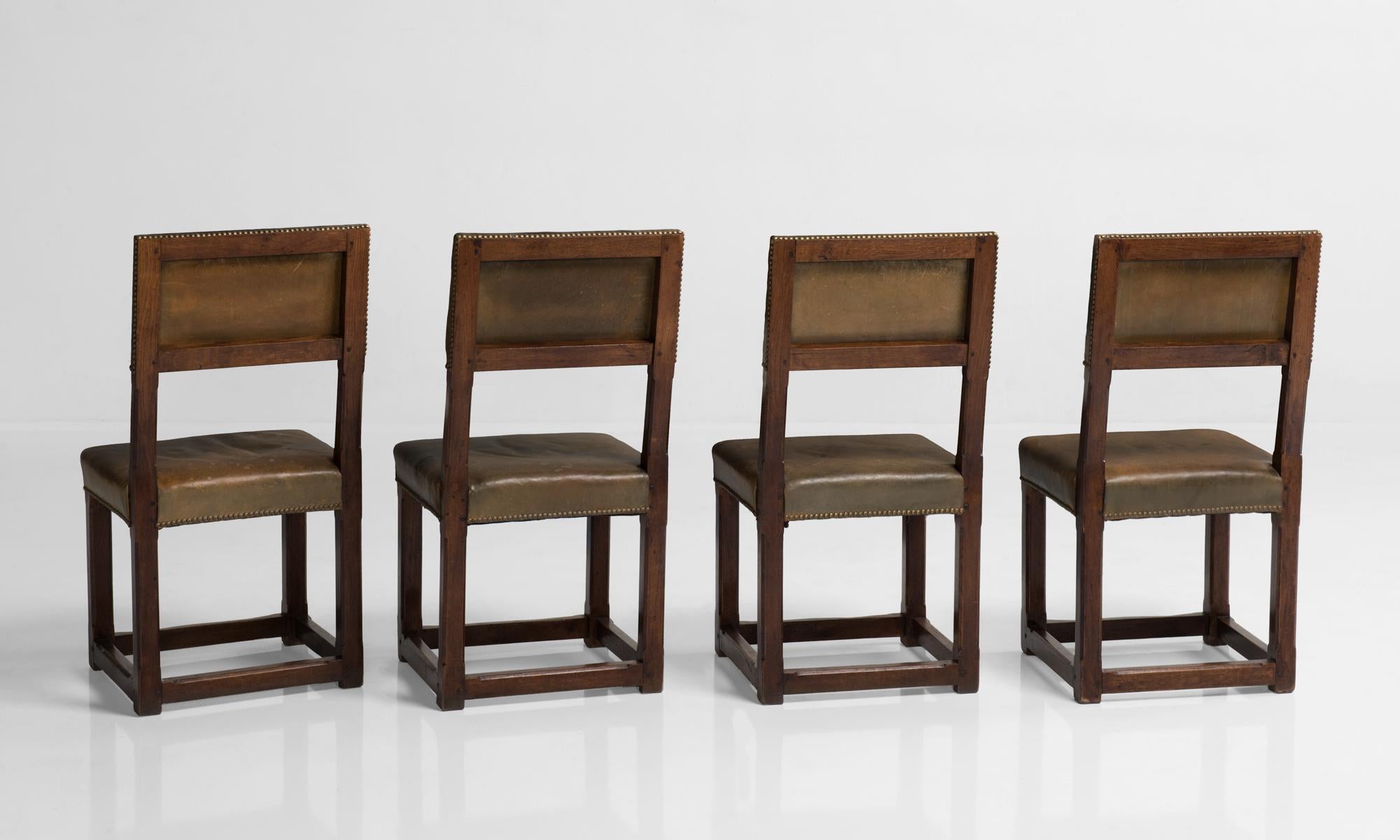 English Set of Twelve Gothic Oak and Leather Dining Chairs, England circa 1880