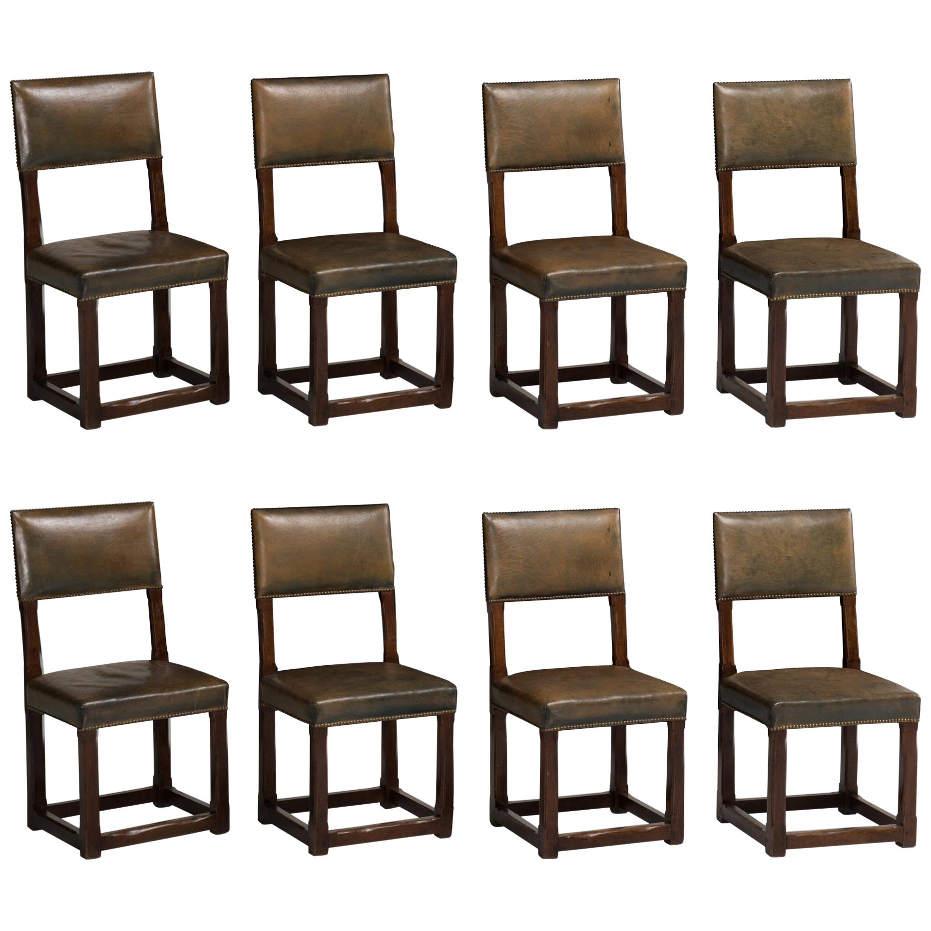 Set of Twelve Gothic Oak and Leather Dining Chairs, England circa 1880