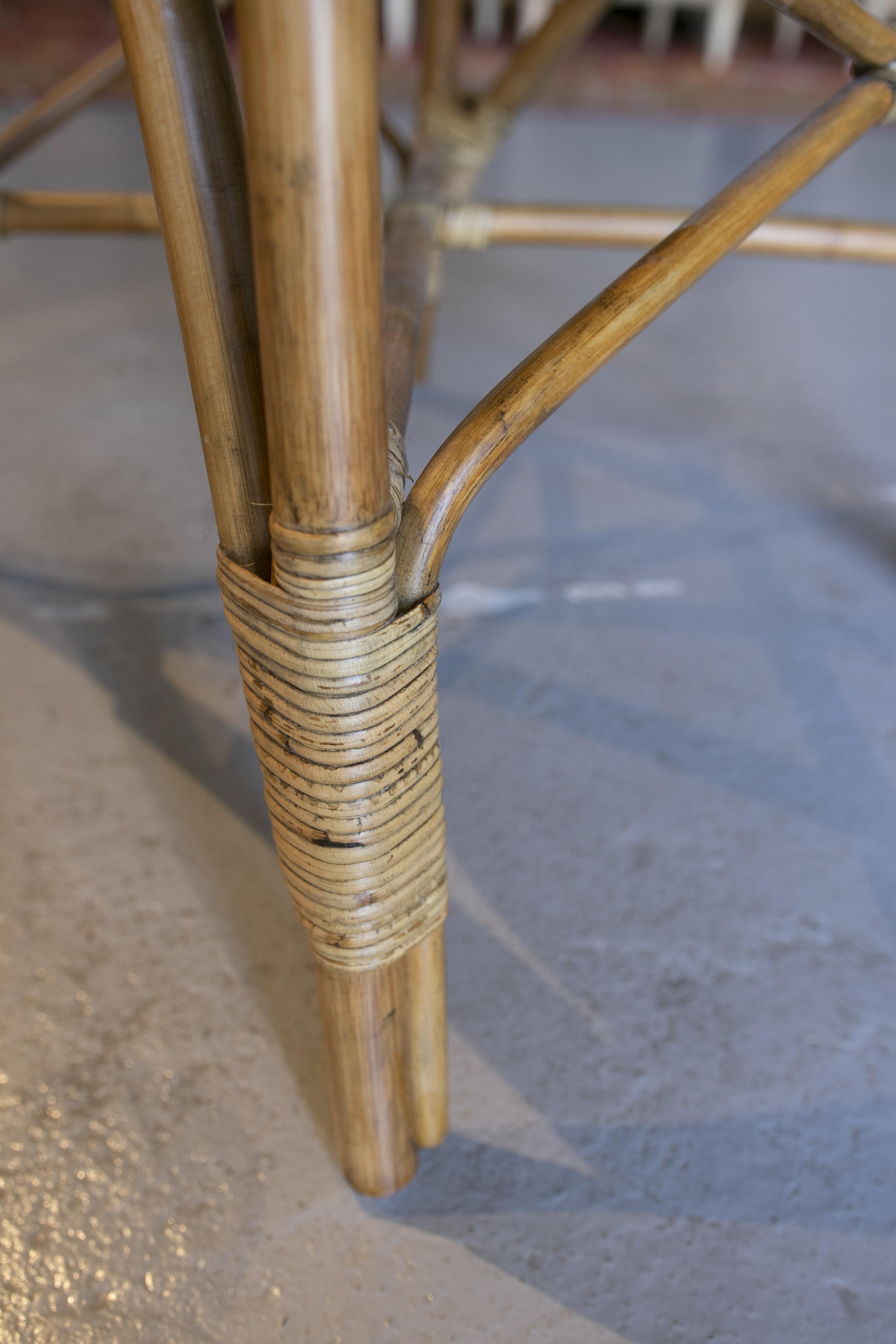 Set of Twelve Handmade Bamboo and Wicker Chairs 9