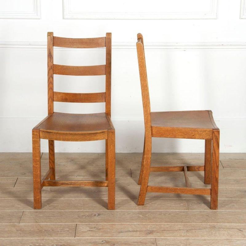 Arts and Crafts Set of Twelve Heals Dining Chairs