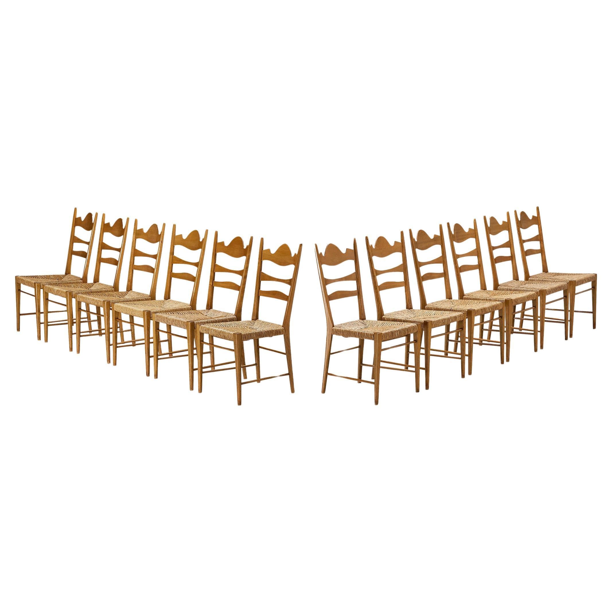 Set of Twelve Italian Dining Chairs with Carved Backs and Straw Seats  For Sale