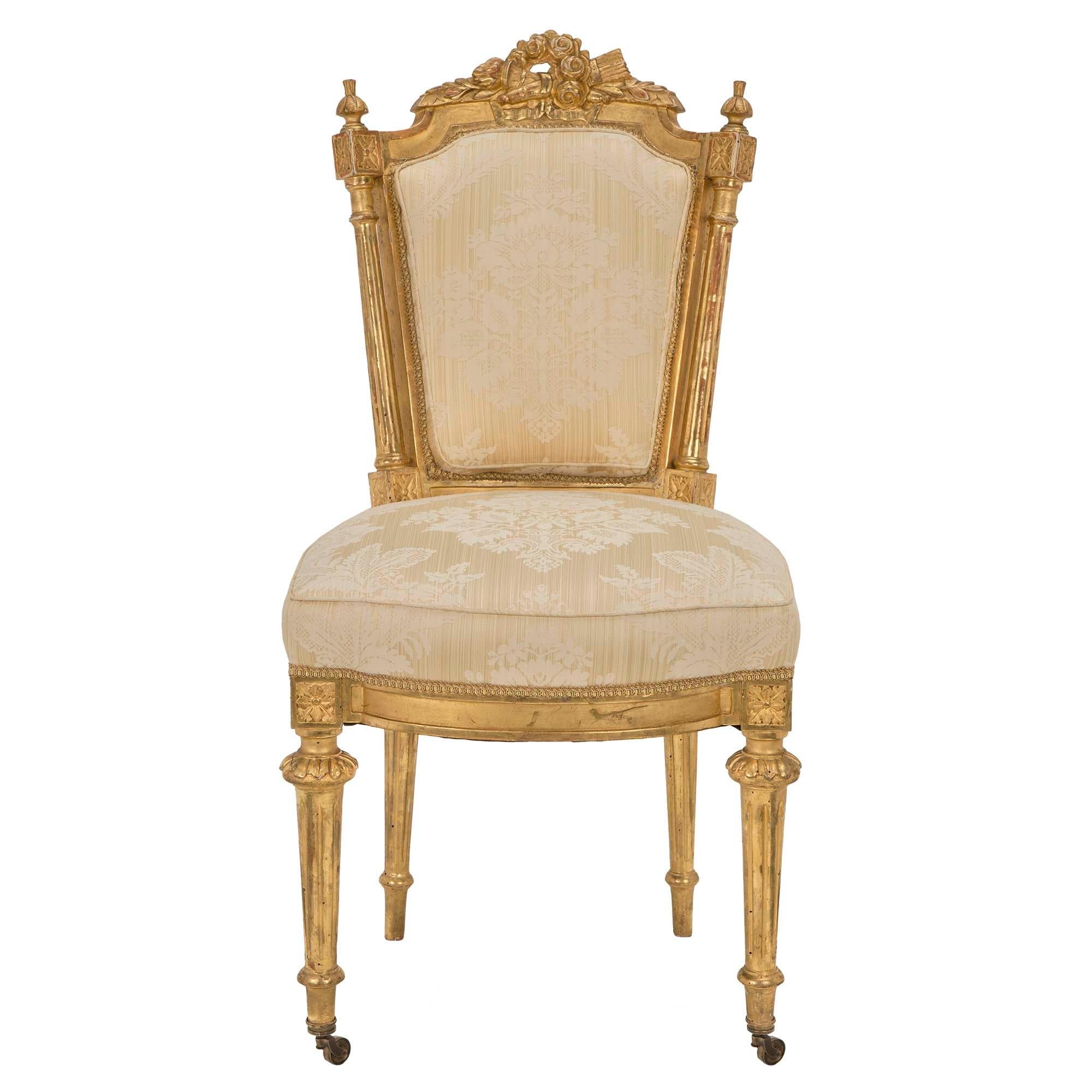 Set of Twelve Italian Early 19th Century Louis XVI Style Giltwood Dining Chairs For Sale 1