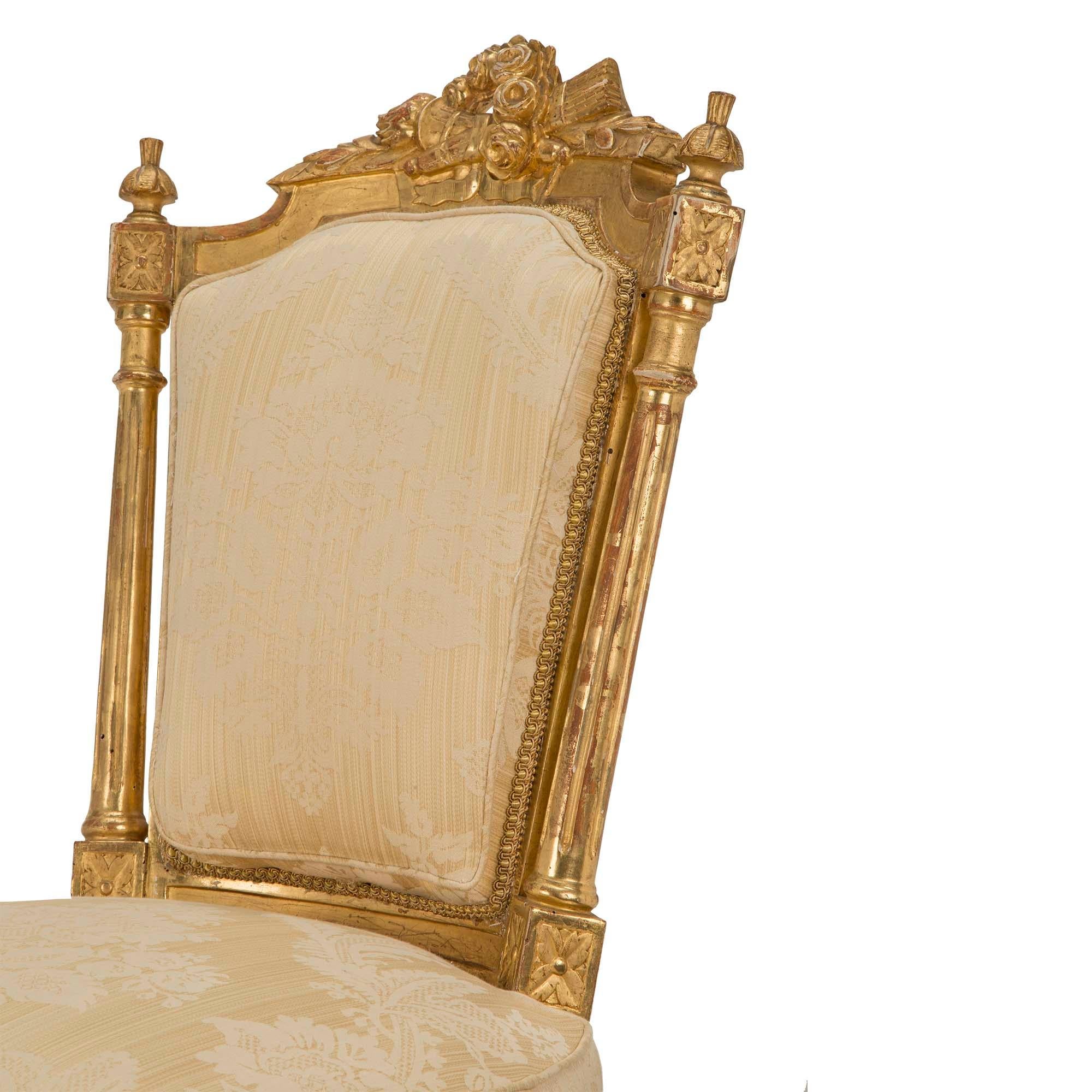 Set of Twelve Italian Early 19th Century Louis XVI Style Giltwood Dining Chairs For Sale 3