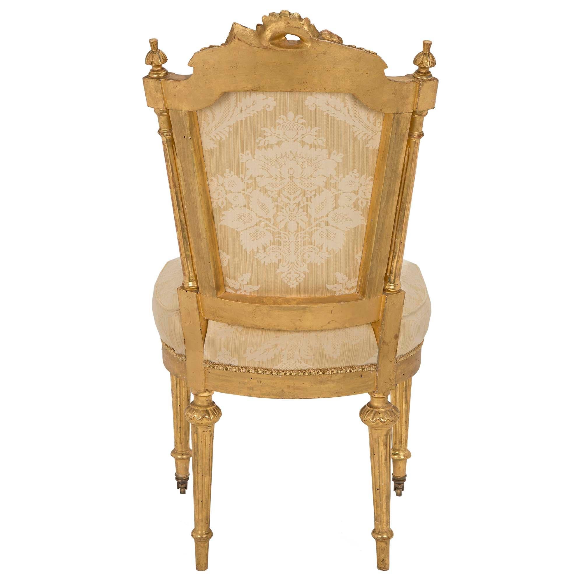 Set of Twelve Italian Early 19th Century Louis XVI Style Giltwood Dining Chairs For Sale 4