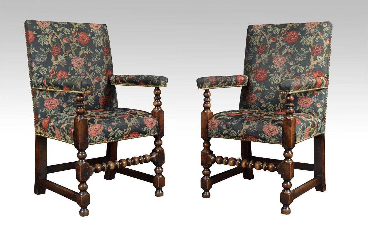 Set of Jacobean style oak framed dining chairs with fully upholstered seat, back and arms all raised up on turned legs and stretchers.

Dimensions:

Height 41.5 inches height to seat 19.5 inches.

Width 22.5 inches.

Depth 25 inches.



 