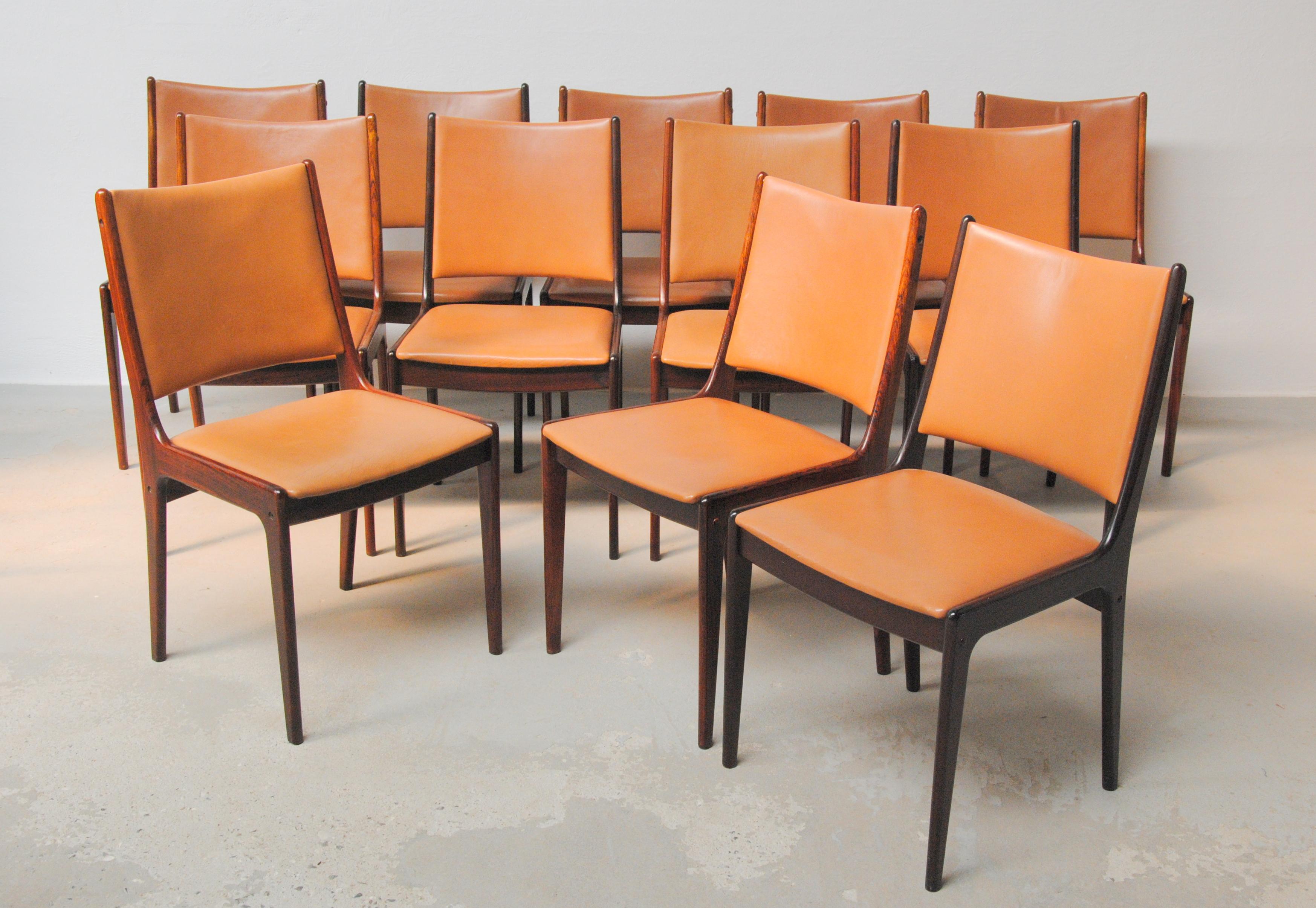 Set of twelve fully restored 1960s Johannes Andersen dining chairs in rosewood made by Uldum Møbler, Denmark.

The set of dining chairs feature a clean simple yet elegant design that will fit in well in most houses. 

The chairs have been fully