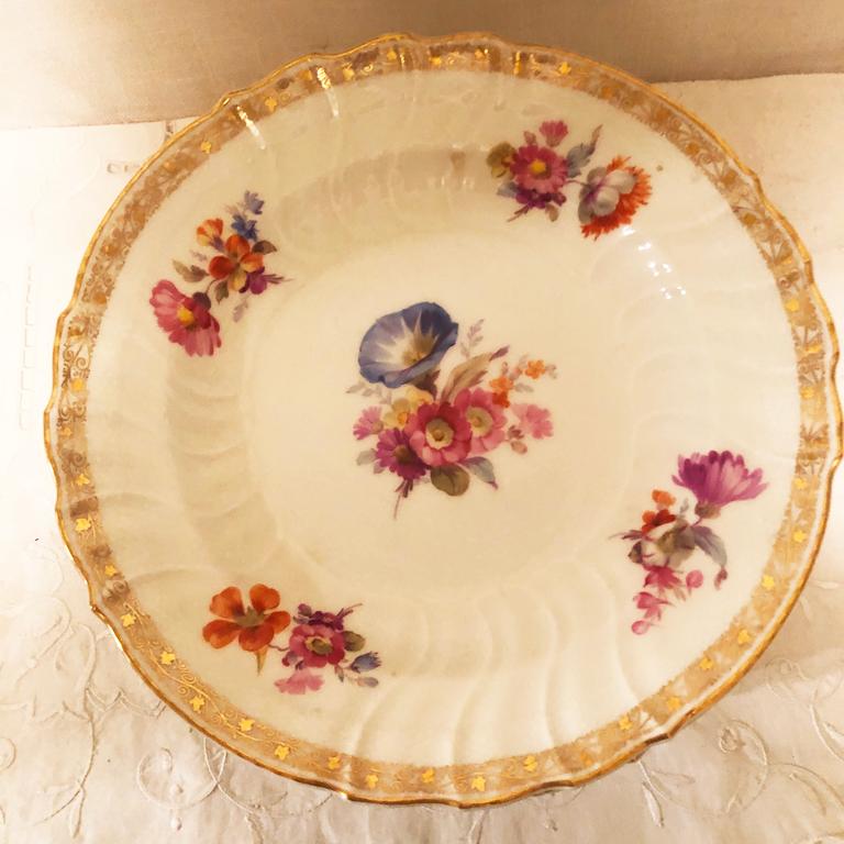 Porcelain Set of Twelve KPM Dinner Plates with Different Hand Painted Floral Bouquets
