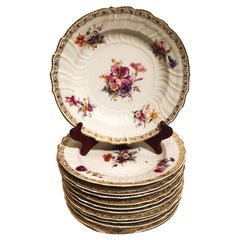 Set of Twelve KPM Dinner Plates with Different Hand Painted Floral Bouquets
