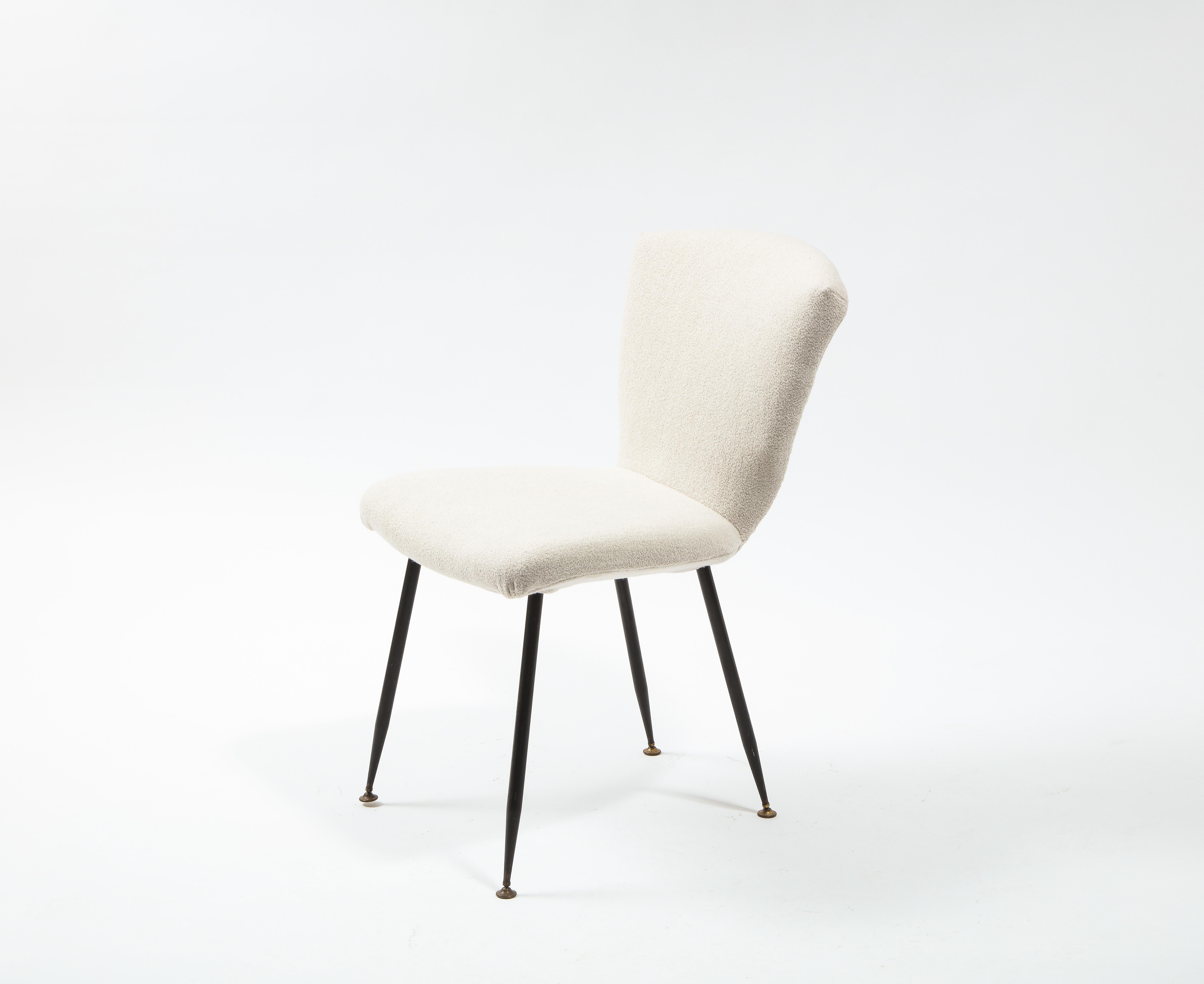 Twelve dining chairs by Louis Sognot for Arflex. These chairs use the same leg system as the 