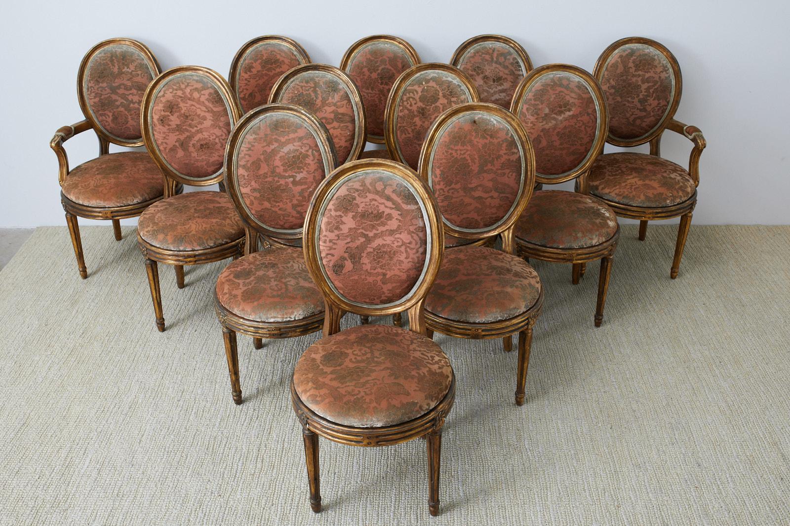 Set of Twelve Louis XVI Style Giltwood Dining Chairs (Louis XVI.)