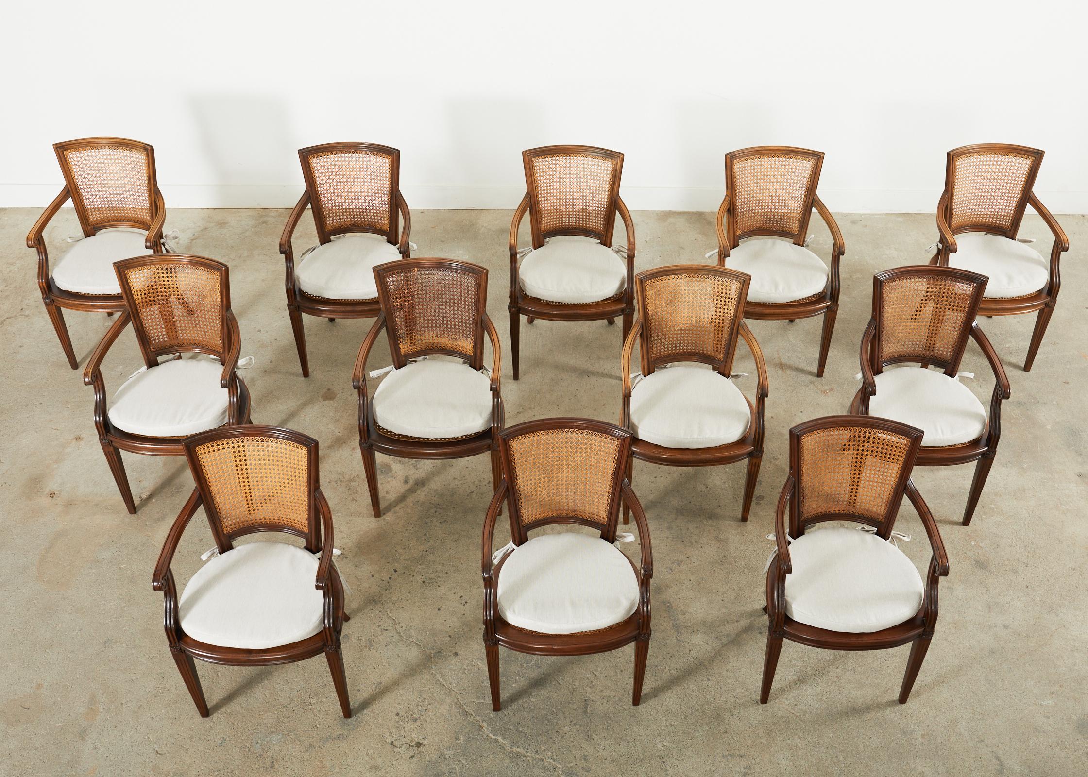 French Set of Twelve Louis XVI Style Mahogany Cane Dining Armchairs  For Sale
