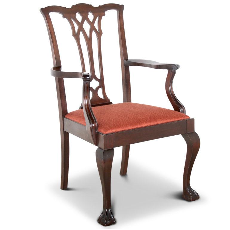 A set of twelve, solid mahogany framed, Chippendale-style dining chairs with pierce-carved back splats and cabriole legs terminating in ball-and-claw feet.
A handsome and comfortable set of American-made, early 20th Century, chairs, with ten side