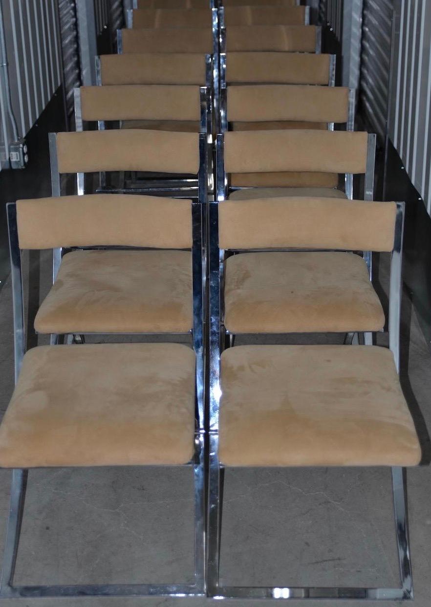 Set of twelve Marcello Cueno Mobel Italia folding chairs, circa 1970s.

Chrome and upholstered 