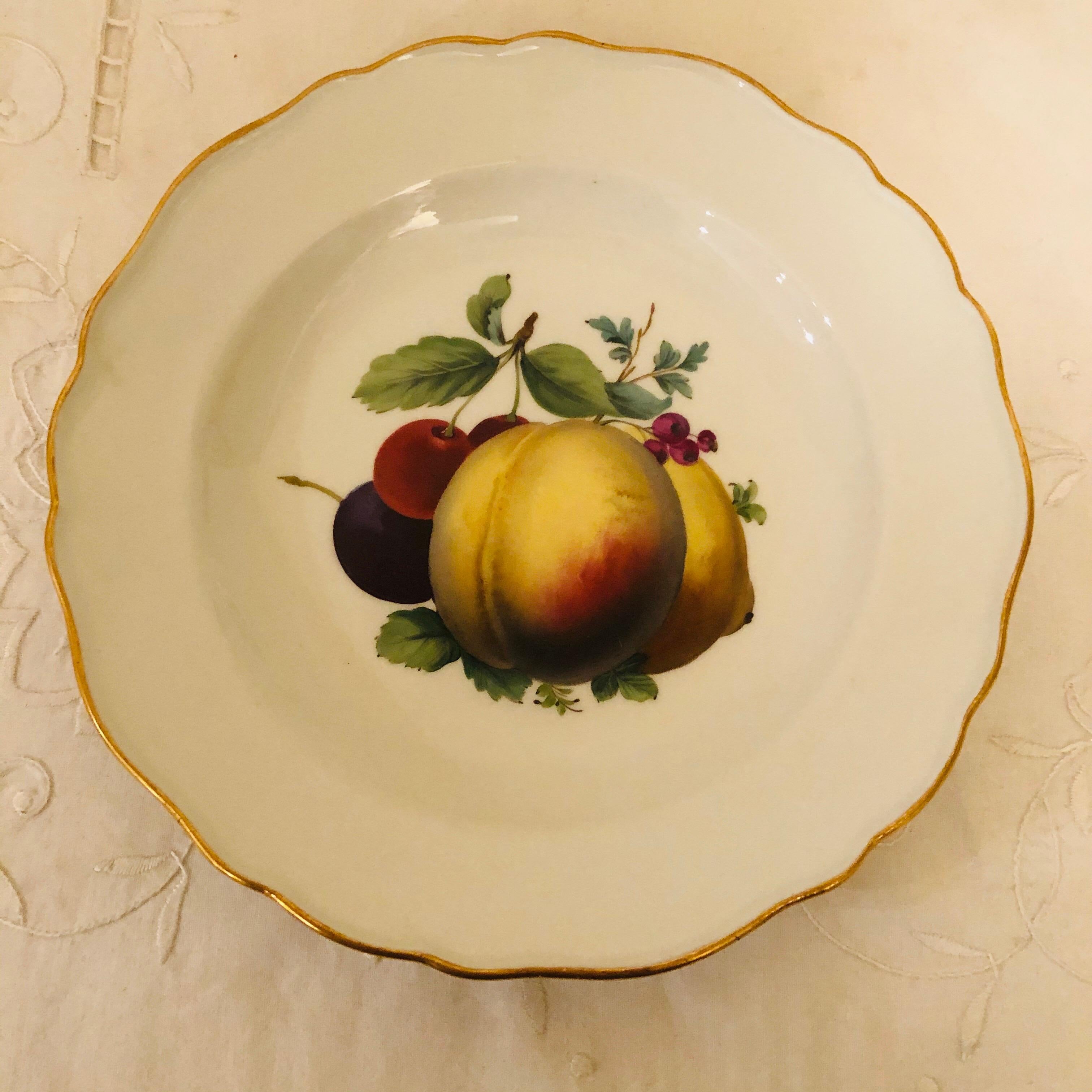 This is a wonderful set of twelve Meissen dessert plates each masterfully painted with different fruit paintings. They are from 1880s, and they are all the best first quality Meissen. The paintings of the fruits on these plates are museum quality.