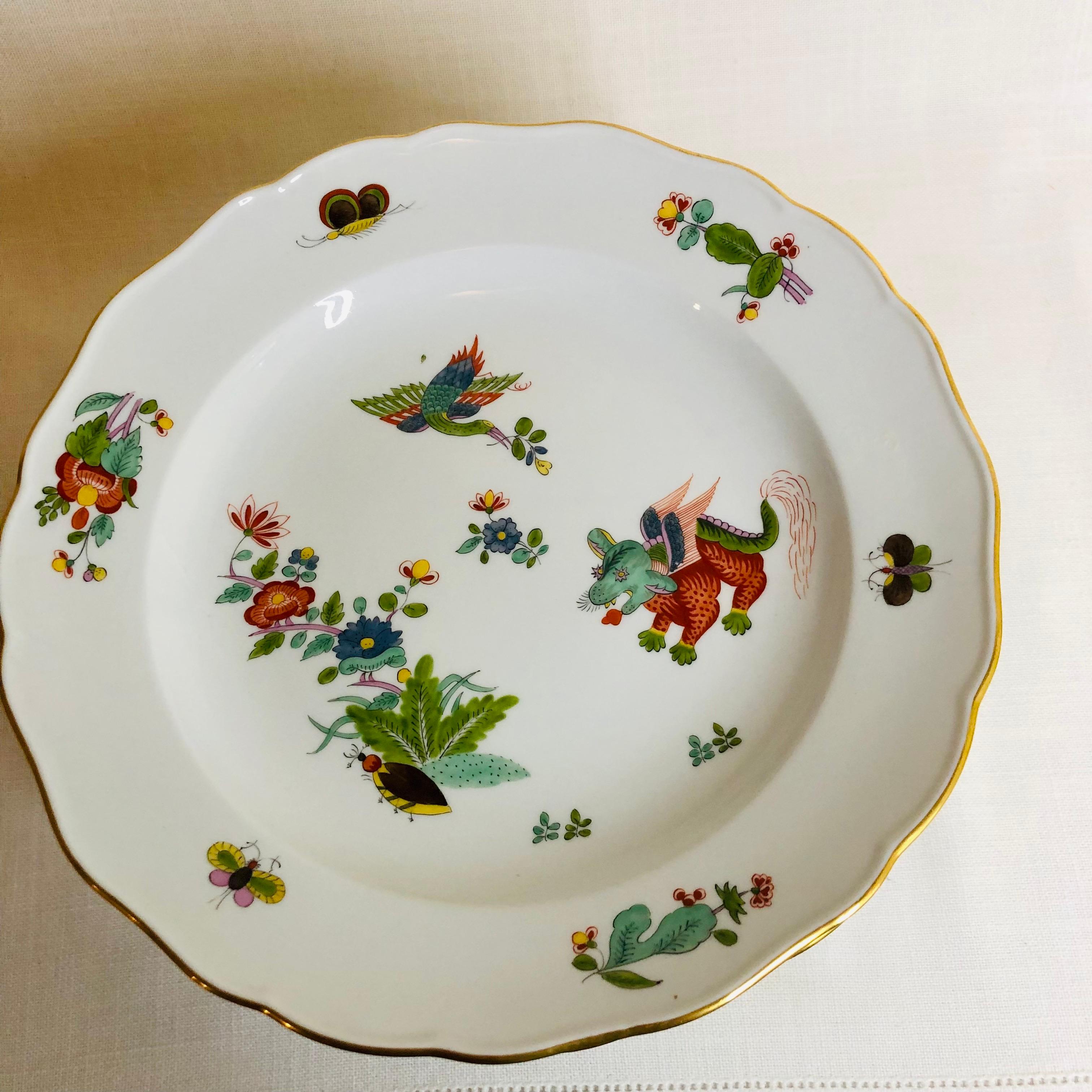 Hand-Painted Set of Twelve Meissen Dinner Plates with Flying Mythological Dragons and Cranes