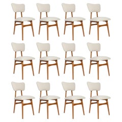 Used Set of Twelve Mid Century Butterfly Chairs, Boucle, Light Wood, Europe, 1960s