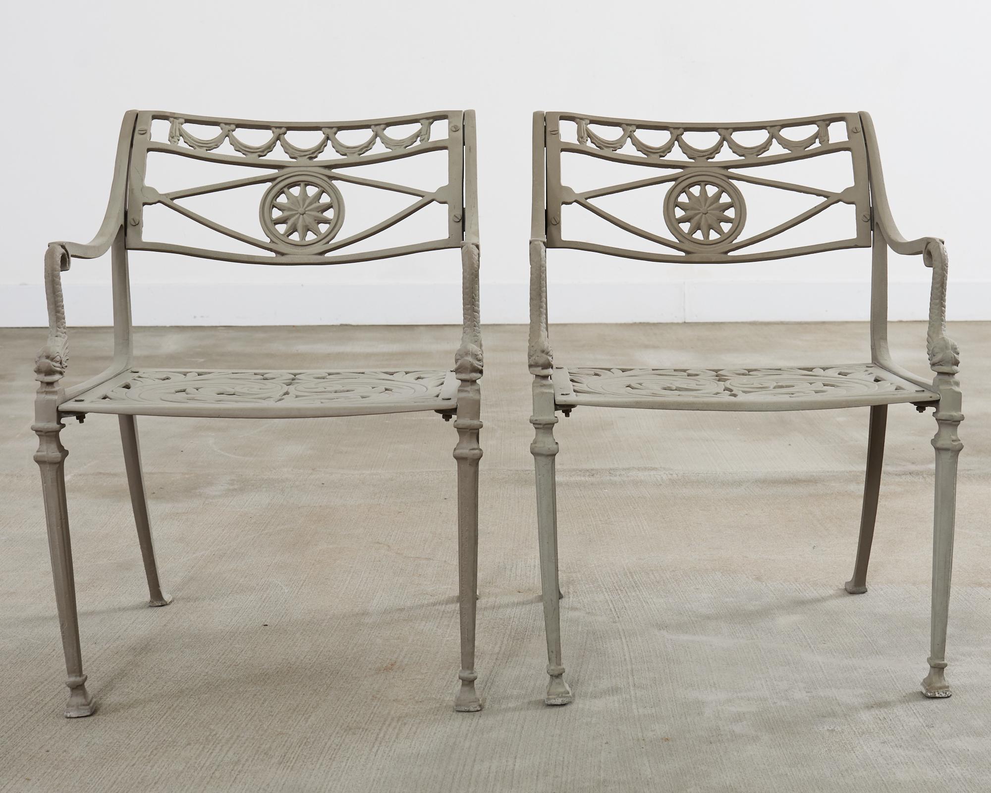 Cast Set of Twelve Neoclassical Dolphin and Star Garden Dining Armchairs