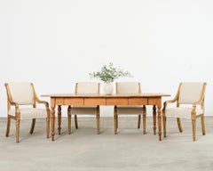 Set of Twelve Neoclassical Louis XVI Style Giltwood Dining Chairs