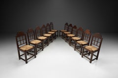 Set of Twelve Oak and Straw Dining Chairs with Geometric Backs, Spain ca 1930s